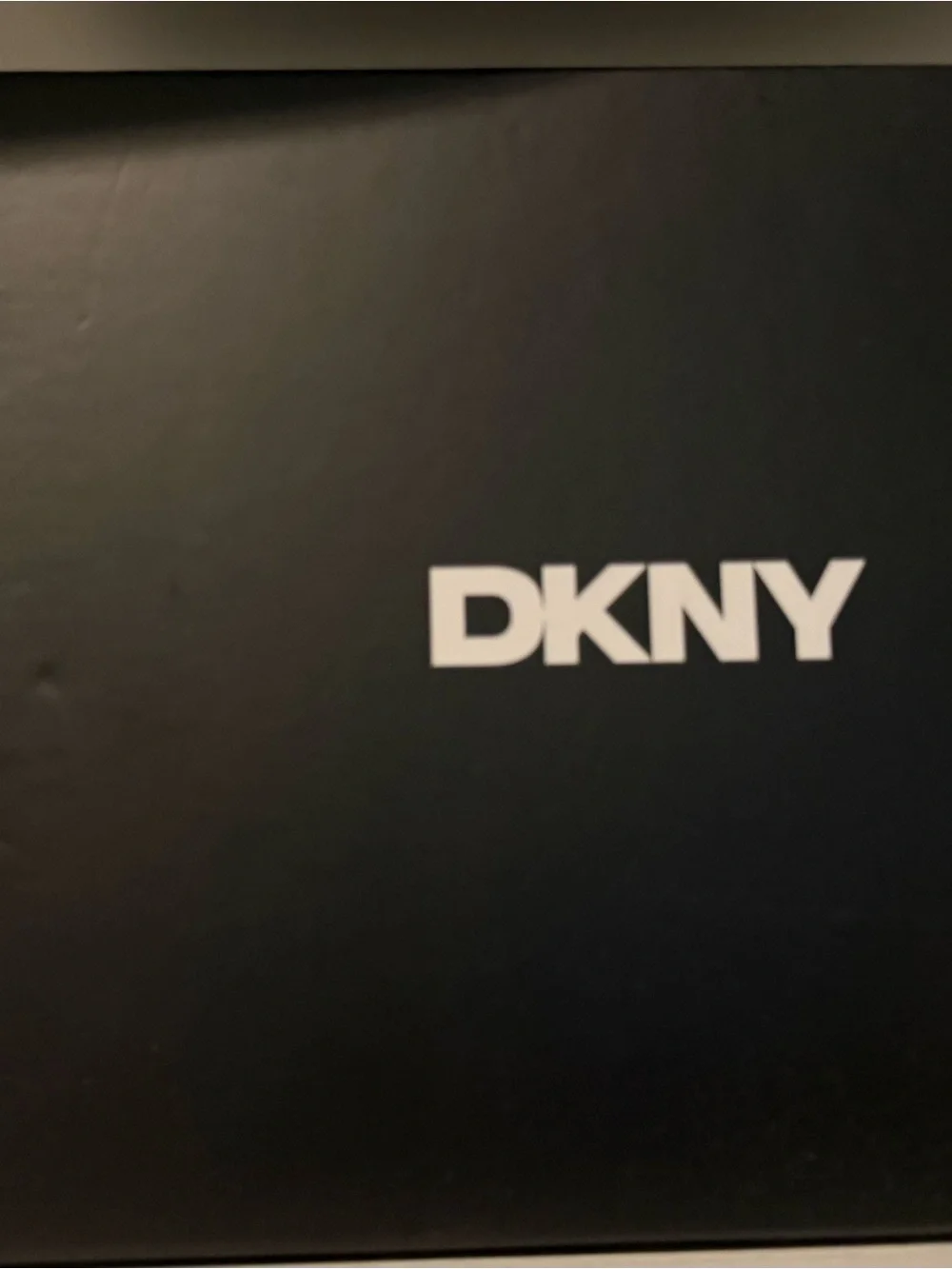 DKNY Black Quilted Chevron Leather Zip Wallet with Gold Logo